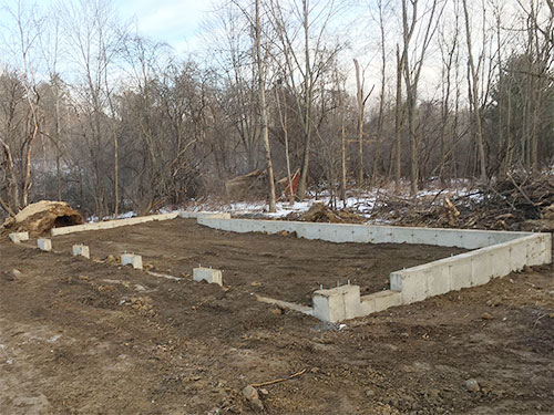 Bare foundation walls, before pouring the concrete slab